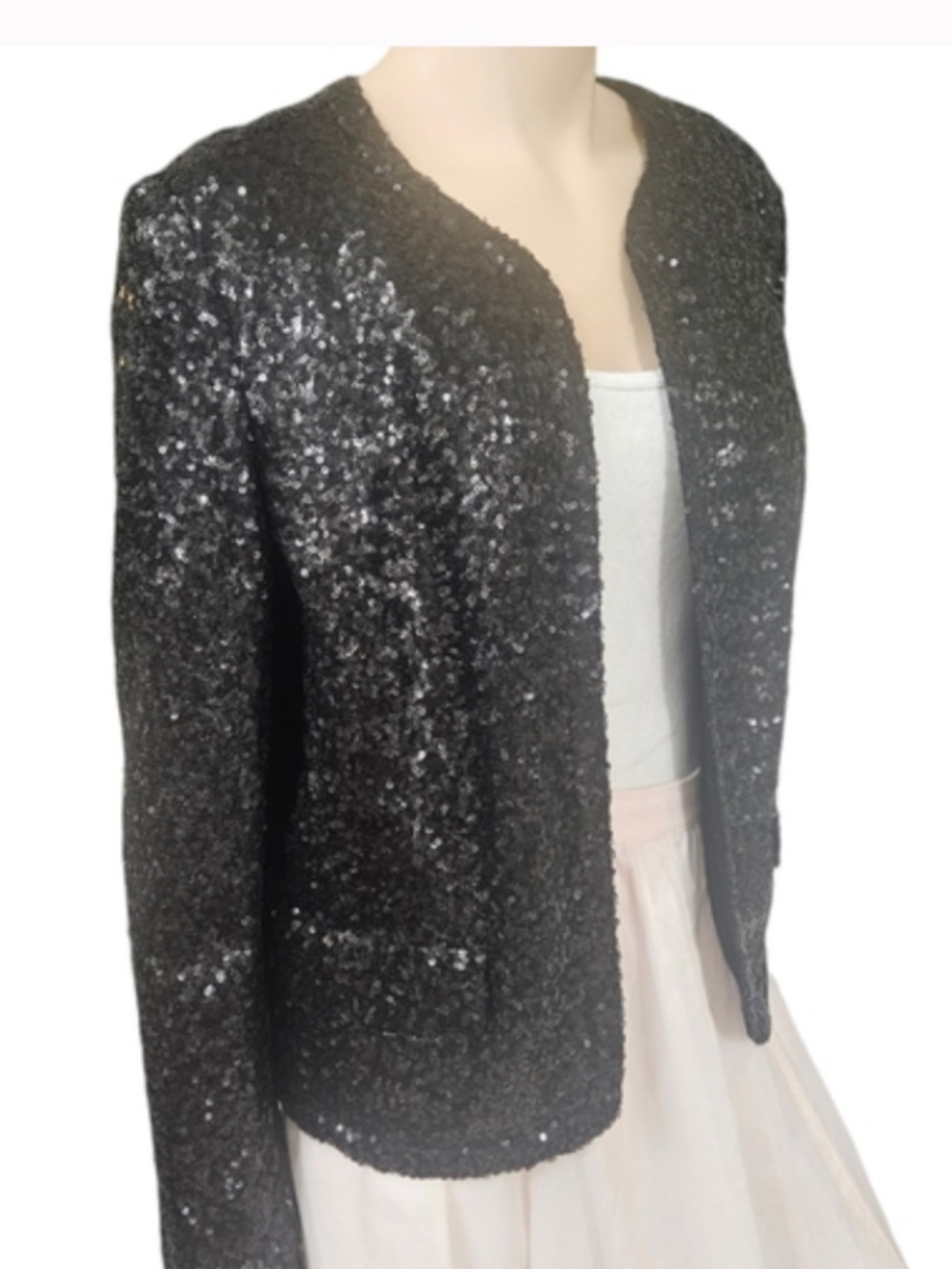 Juicy black sequin jacket.